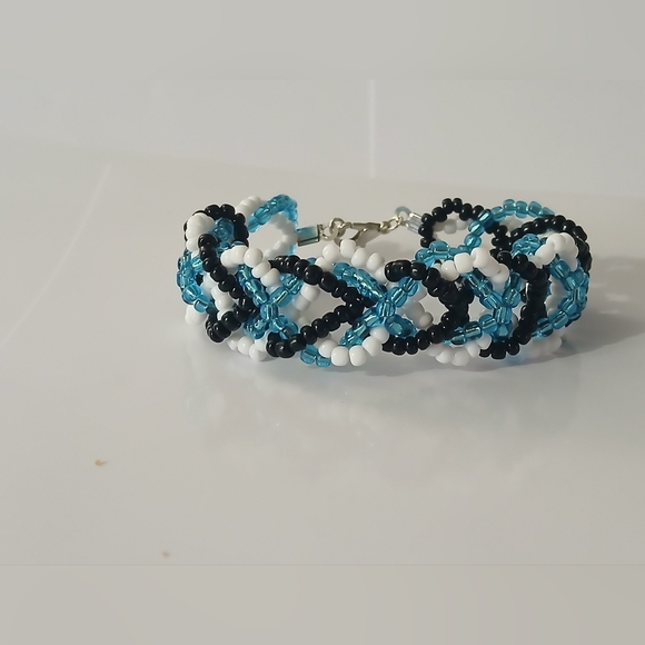 Elegant Beaded Bracelet in Blue, Black, and White - Picture 1 of 6
